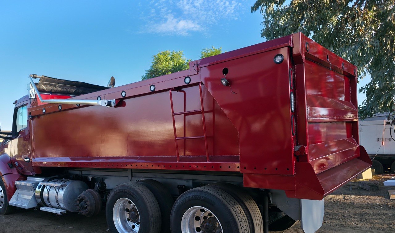 Custom red dump truck body built by The Welding Brothers, Perris CA